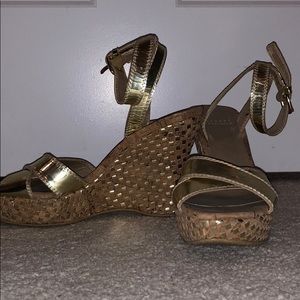 Stuart Weitzman gold wedges